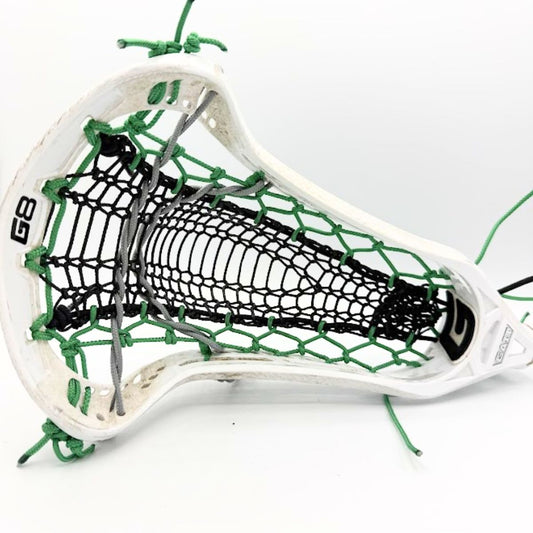 Blackwood Forest custom lacrosse pocket featuring black Armor Mesh and dark green strings
